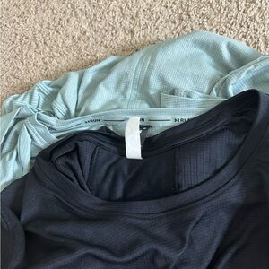 Bundle of light green and black under armor active wear t shirts